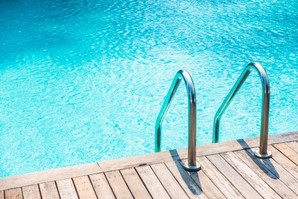 Backyard swimming pool with clear water