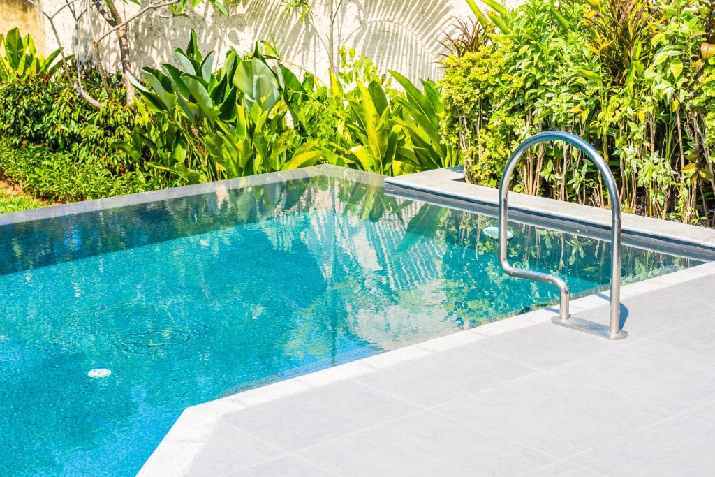 Beautiful landscape outdoor swimming pool in hotel and resort