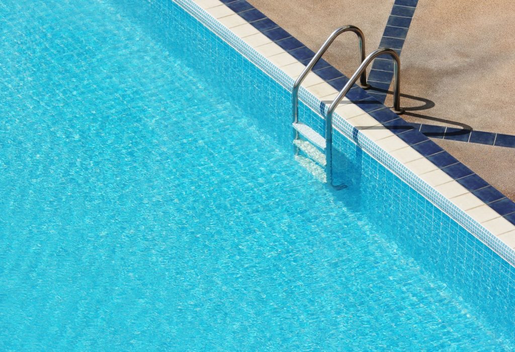 Outdoor swimming pool on a sunny day
