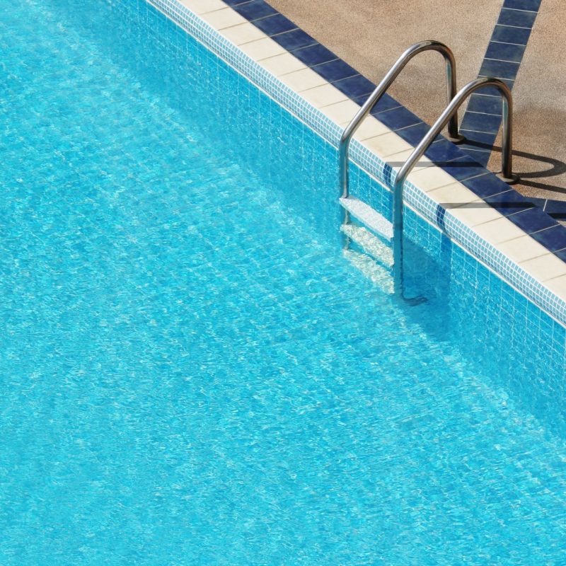 Outdoor swimming pool on a sunny day